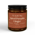 A jar candle with a black lid and a terracotta-colored label reading 'The Candle Plug Spiced Pumpkin Ginger' on a white background.