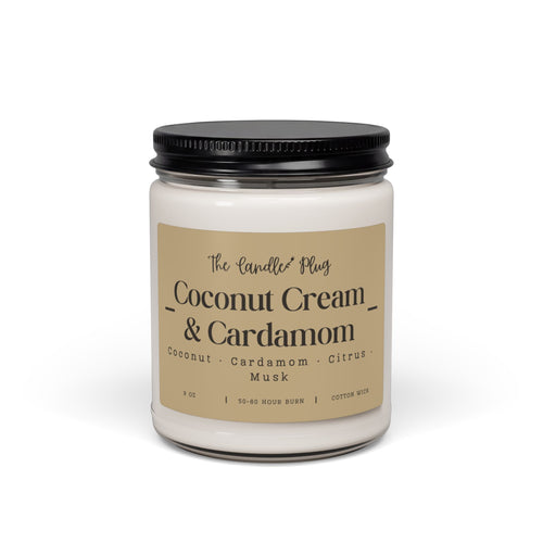 A jar candle with a black metal lid and a beige label reading 'The Candle Plug Coconut Cream & Cardamom' on a clean white background.