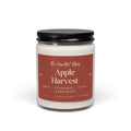 A fall candle with white wax, a black metal lid, and a dusty rose label reading 'The Candle Plug' and 'Apple Harvest' on a clean white background.