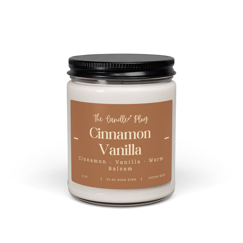 A jar candle with a black screw-on lid and a tan label reading 'The Candle Plug Cinnamon Vanilla' on a clean white background.
