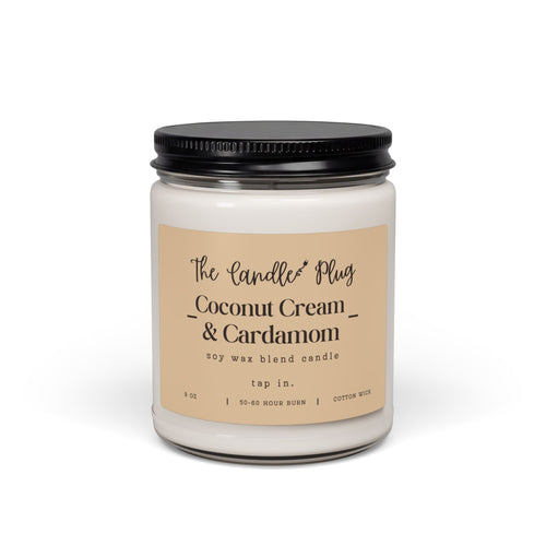 A Coconut Cream and Cardamom soy candle with white wax, a black metal lid, and a beige label reading 'The Candle Plug Coconut Cream & Cardamom' on a clean white background.