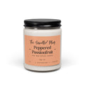 A 9 oz Peppered Passionfruit soy candle in a clear glass jar with a black metal lid and a peach-colored label. The label reads 'The Candle Plug' and 'Peppered Passionfruit'.