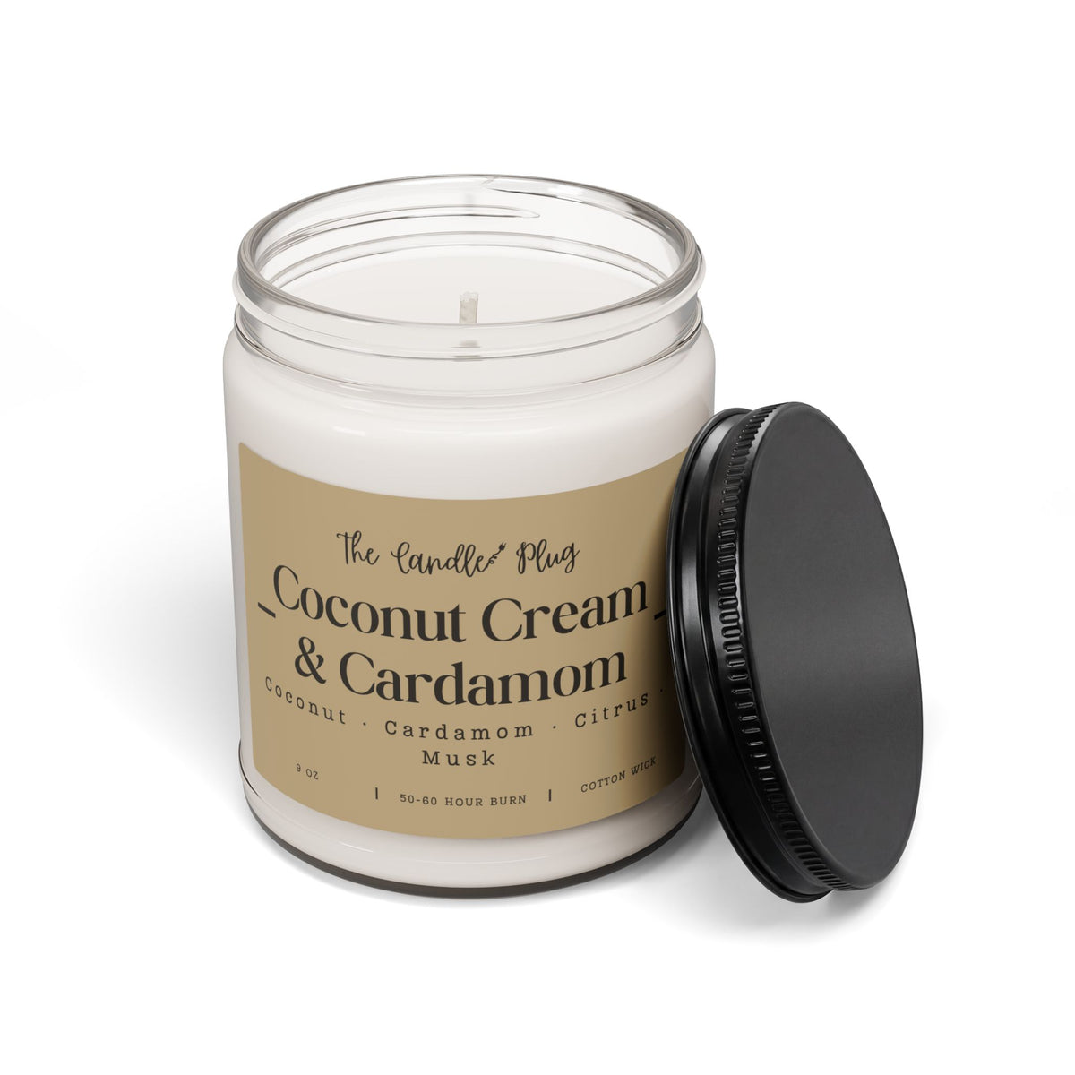 A white wax candle in a clear glass jar with a tan paper sleeve printed with a black coffee mug and lightning bolt graphic, shown with a black metal lid resting beside it on a white background.